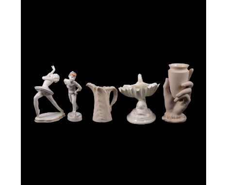 Collection of white Royal Worcester porcelain, mostly white glazed factory blanks including a twin handles vase, shell vase, 