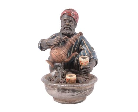 Bergman style cold-painted bronze sculpture of a street vendor, modelled as a man aside a brazier serving tea, stamped mark '
