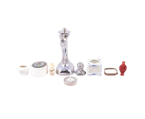 A chrome-plated Art Deco style table lighter, the hinged cover modelled as Mephistopheles with the pedestal cast with a femal