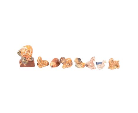 A collection of Wade Whimsies and similar miniature figures. 