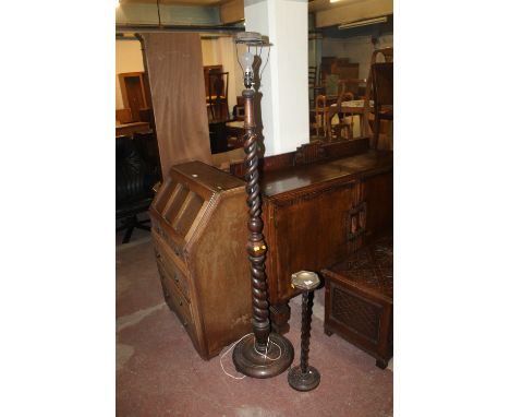 A BARLEY TWIST STANDARD LAMP TOGETHER WITH A BARLEY TWIST SMOKERS STAND 