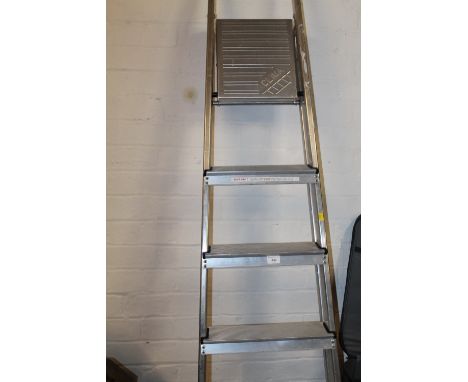 A SET OF ALUMINIUM STEPS TOGETHER WITH A LADDER STAND 