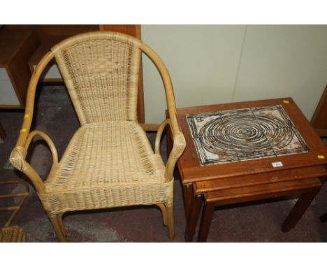 A TILE TOP NEST OF TABLES TOGETHER WITH TWO FOLDING WICKER CHAIRS, PLUS ANOTHER  