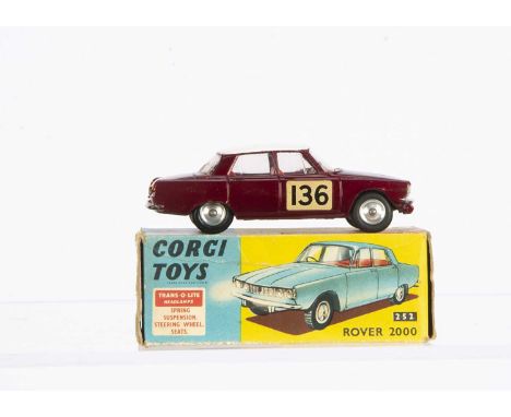 A Corgi Toys 322 Rover 2000 In Monte Carlo Trim, metallic maroon body, white roof, red interior, RN136, spun hubs, in origina