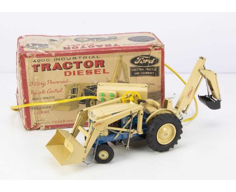 A Cragstan Battery Powered Ford 4000 Industrial Diesel Tractor, tinplate remote control toy, cream body, blue chassis, transp