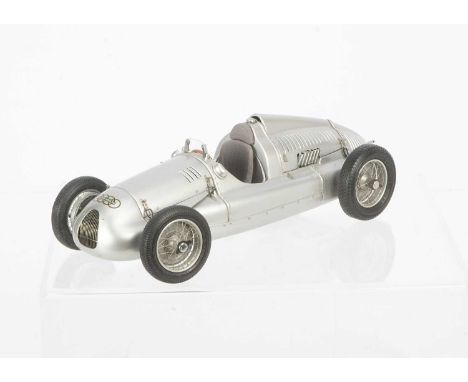 A CMC 1:18 Auto-Union Typ D 1938-1939, M-027, in original box with certificate and swing tag, F, some exhaust pieces loose, d