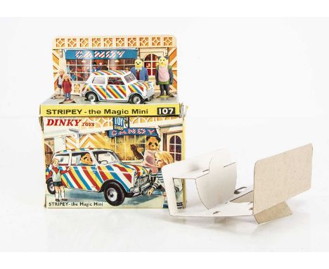 A Dinky Toys 107 Stripey The Magic Mini, with Candy, Andy and the Bearandas, in original box with inner stand and packing pie