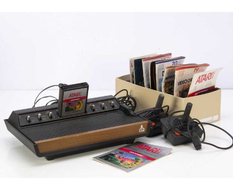 Atari 2600 'Woody' Video Game Console, six switch version, with two Joysticks, Ingersoll Power Adapter and thirteen games inc