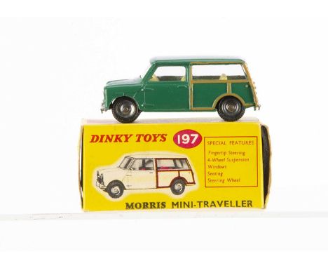 A Dinky Toys 197 Morris Mini Traveller, dark green body, lemon interior, black matt base, spun hubs, in original box, VG-E, a