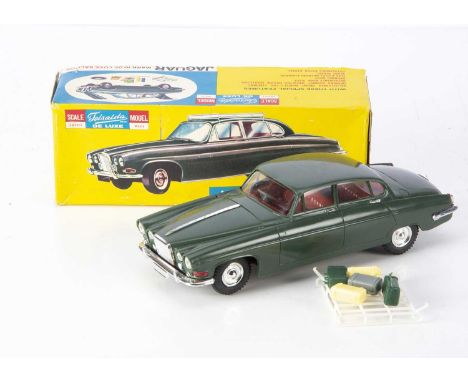 A Telsalda (Hong Kong) Jaguar Mark 10 De Luxe Saloon, large scale plastic friction drive model, dark green body, red interior