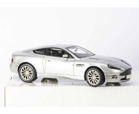 Kyosho 1:12 Aston Martin V12 Vanquish, No.08603S2, in original box, VG, windscreen wipers have been snapped off, one still pr