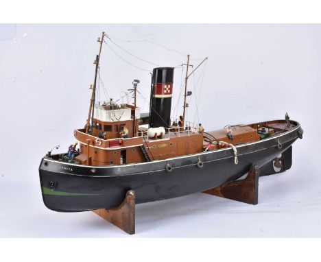 A scratch built radio-controlled 1:32 scale Steam Tug 'Cervia', built by Alan Lock using grade 1 yellow pine, marine ply and 