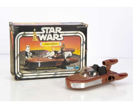 Vintage Star Wars Kenner Land Speeder, with opening bonnet and floating action wheels, in original box with 'LP' logo on both
