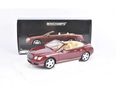 Minichamps 1:18 Scale Bentley Continental GTC 2006, boxed 100 139030 Bentley in metallic red livery, VG-E, box VG