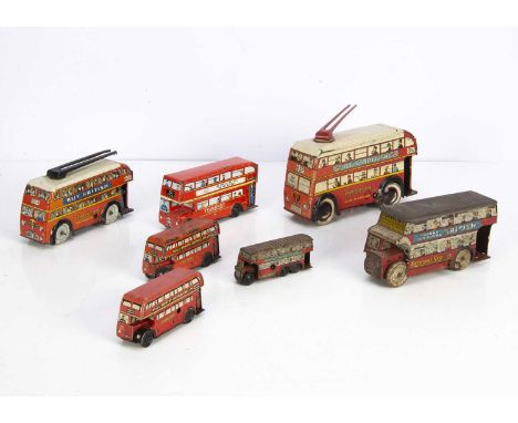 Seven various sizes Wells Brimtoy Double Deck Buses and Trolleybuses, early small 6-wheel Pocketoy Bus, P rust most areas, cl