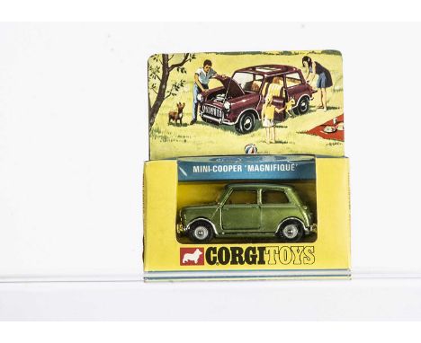 A Corgi Toys 334 Mini Cooper 'Magnifique', metallic green body, cream interior, sunshine roof, detailed cast hubs, in origina