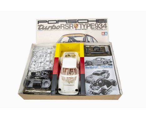 Tamiya 1:12 Scale Porsche Turbo RSR Type 94 Kit, boxed 1220 unmade kit with instructions, decals present but are partially ad