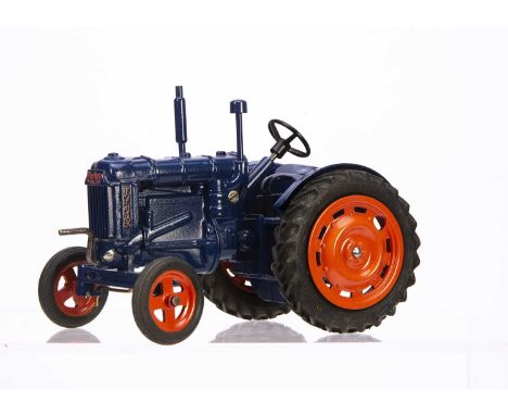 A Chad Valley No.9235 Fordson Major Tractor, dark blue diecast body, orange wheels, crank handle clockwork mechanism, 'Goodye