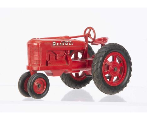 A 1950s Lego Large Scale Plastic McCormick Farmall Tractor Nr.770, red plastic body and wheels, rubber steering wheel, black 