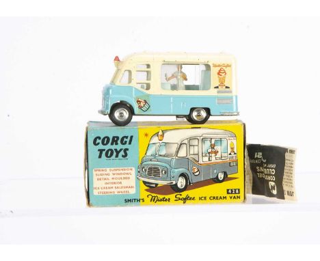 A Corgi Toys 428 Karrier 'Mister Softee' Ice Cream Van, blue/white body, salesman figure, spun hubs, in original box with clu