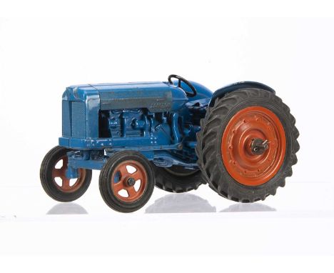 A Chad Valley No.M59 New Fordson Major Tractor, blue diecast body, tinplate bonnet, orange wheels, clockwork motor contained 