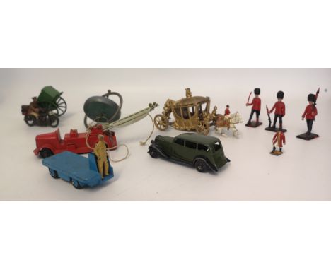 Lot of vintage Toys to include Britain Ltd Dispatch Rider, Dinky Toy Car and B.E.V. Truck and DSM Crescent Fire Truck with ot