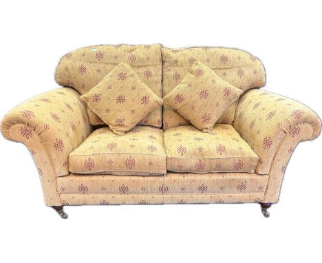 A reproduction two seat settee