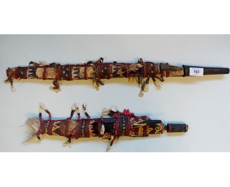 Pair of Antique handmade tribal headhunter swords.