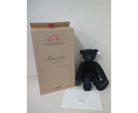 A Steiff Schwarzbar, mohair, 35cm tall, Limited Edition number 746 of 1500, boxed with outer box and certificate, as new and 