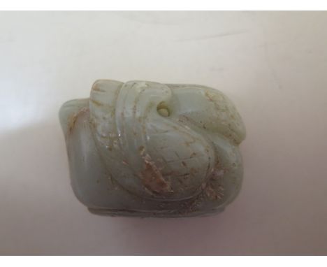 A carved jade duck pendant, 4cm x 3cm x 2cm, in good condition 