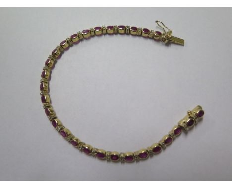 An 18ct yellow gold ruby and diamond bracelet, 20cm long, marked 750, total weight approx 19.2 grams, in good overall conditi