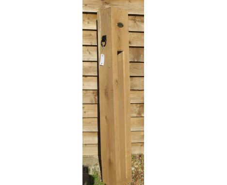 A new green oak bicycle lock post, 157cm tall x 19cm x 19cm with plaque and ring plate 