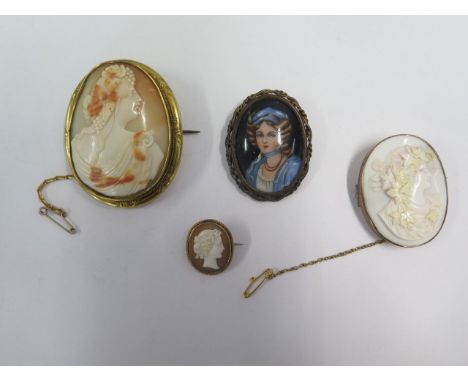 Three cameo brooches in gilt metal mounts and a Limoges brooch, largest cameo 6cm x 5cm, all generally good except lighter ca