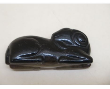 A carved jade ram, 6cm x 2.5cm, in good condition 