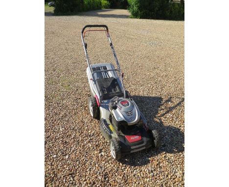 An AI-KO silver 520 BR petrol lawn mower with a Briggs and Stratton 650E series ready start 190cc engine and premium 4 in 1 f