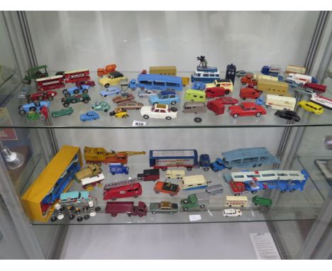 A collection of Dinky, Corgi and Lesney diecast vehicles, approx 65 and 12 road signs, all original no repaints 