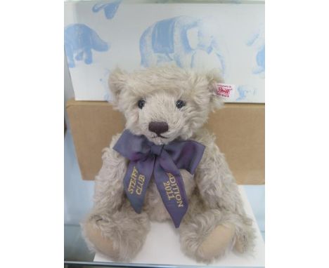 A Steiff Club bear 2011, 30cm tall, Limited Edition number 1246, limited to the year 2011, boxed with outer box and certifica