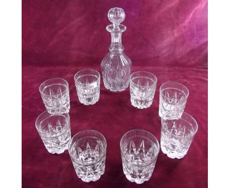 A cut glass decanter and eight heavy cut glass whisky glasses