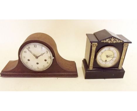 A Victorian slate mantel clock with architectural mounts and a 1930's oak Westminster chime mantel clock