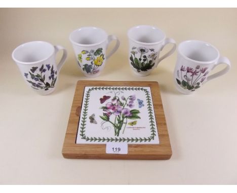 A Portmeirion Botanic Garden set of four mugs and a tile stand