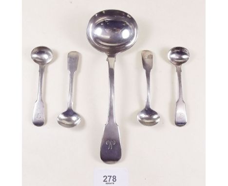 Four silver salt spoons London 1824 and a silver sauce ladle