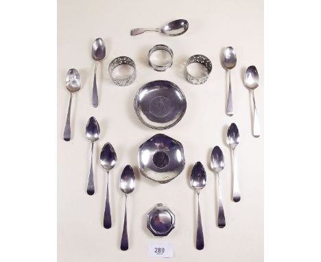 Ten various silver teaspoons, a silver coin set dish, napkin ring, caddy spoon and compact  (212g) plus two silver plated nap