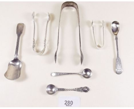 Three pairs of silver sugar tongs, three silver cruet spoons and a silver caddy spoon, total 119g