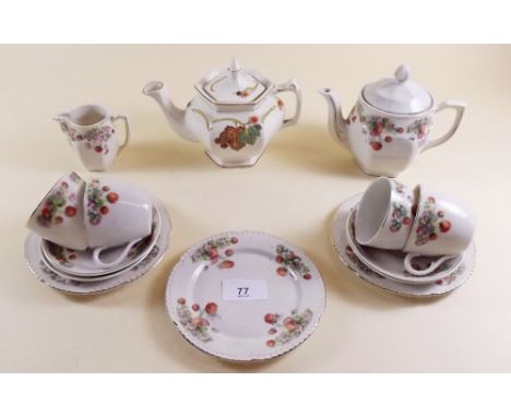 A childs tea service decorated strawberries and a small teapot 'Vine'