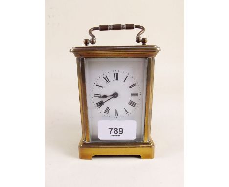 A brass cased carriage clock