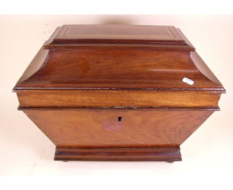 A Regency mahogany and satinwood inlaid tea caddy fitted three hinged divisions