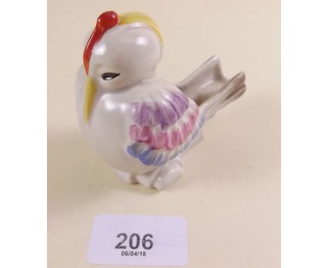 A Clarice Cliff bird form pipe holder in pink and blue (small chip)