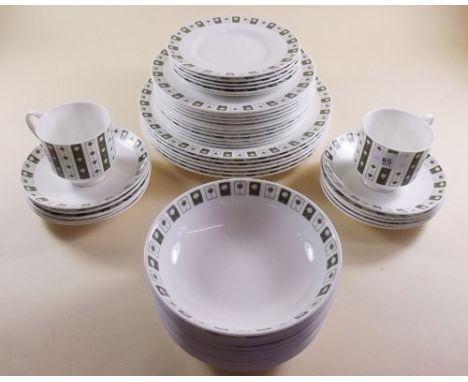 A Wedgwood Susie Cooper dinner service 'Neptune' comprising: six 10.5" dinner plates, eleven breakfast and six small side pla