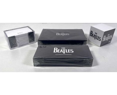 A collection of pens and writing pads relating to The Beatles to include: a Beatles Anthology DVD promo sticky notes pad, a B