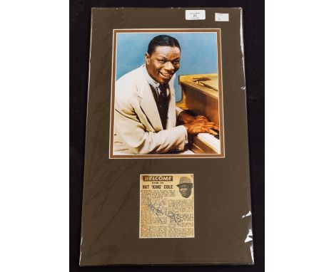 Nat King Cole Colour Picture mounted with a newspaper / magazine Cutting of Nat King Cole signed in blue biro.